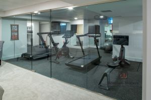 Coastal Comfort & Custom Gym Basement Remodel