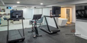 Coastal Comfort & Custom Gym Basement Remodel